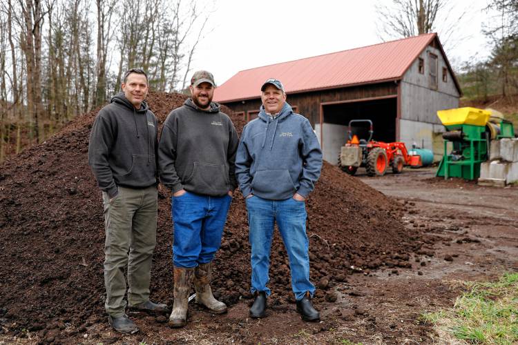 Bear Path Compost owners Mark Melnik, from left, Mike Mahar and Peter Melnik on Saturday morning in Whately.