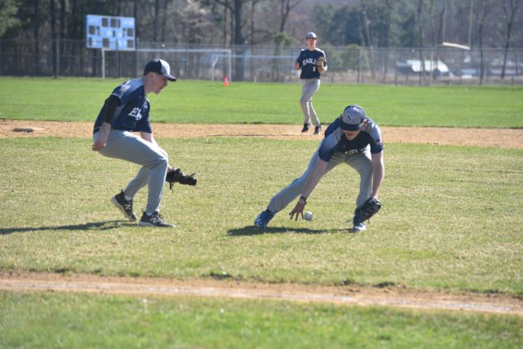 Franklin Tech's Mason Lehtomaki grabs a ground ball while Jacob Martin backs him up against Athol on Monday in Turners. 