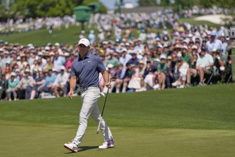 Rory McIlroy, of Northern Ireland, reacts after missing a putt on the second hole during the final round at the Masters golf tournament, Sunday, April 13, 2025, in Augusta, Ga. (AP Photo/David J. Phillip)