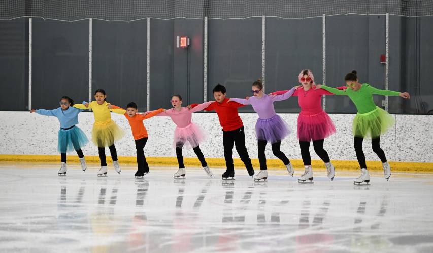 Members of the Bridge Group skate to “Footloose” by Kenny Loggins at the ice rink at Deerfield Academy on Saturday.