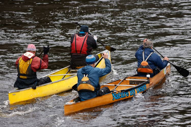 Competitors make their way down the Millers River during the 60th annual River Rat Race from Athol to Orange on Saturday.