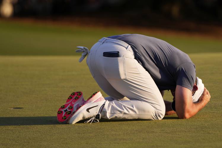 Rory McIlroy, of Northern Ireland, reacts after winning in a playoff against Justin Rose after the final round at the Masters golf tournament, Sunday, April 13, 2025, in Augusta, Ga. (AP Photo/Julia Demaree Nikhinson)