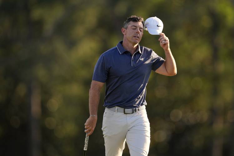 Rory McIlroy, of Northern Ireland, reacts after a bogey on the 18th hole during the final round at the Masters golf tournament, Sunday, April 13, 2025, in Augusta, Ga. (AP Photo/David J. Phillip)