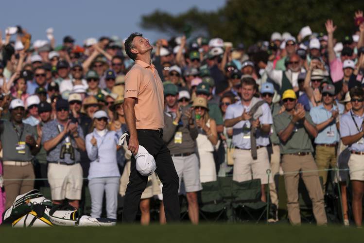 Justin Rose celebrates after a birdie on the 18th hole during the final round at the Masters golf tournament, Sunday, April 13, 2025, in Augusta, Ga. (AP Photo/Matt Slocum)
