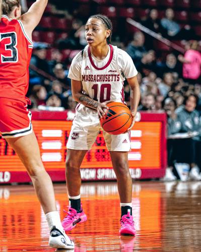 UMass guard Yahmani McKayle (10) sets up the Minutewomen offense during the first half of their 56-38 loss to Davidson on Saturday afternoon at Mullins Center.