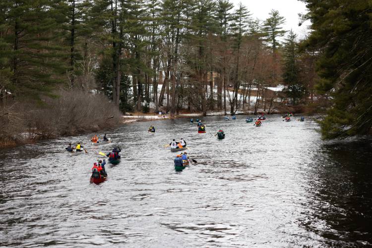Competitors make their way down the Millers River during the 60th annual River Rat Race from Athol to Orange on Saturday.