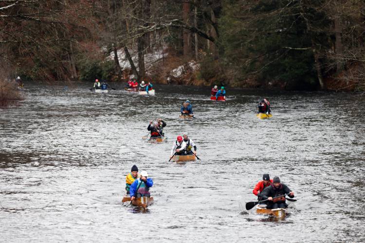 Competitors make their way down the Millers River during the 60th annual River Rat Race from Athol to Orange on Saturday.