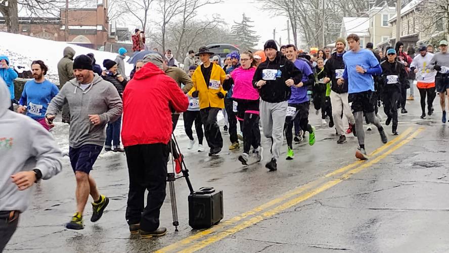 Runners begin the 2025 Big Cheese 5K, a part of the River Rat Race, on Saturday.