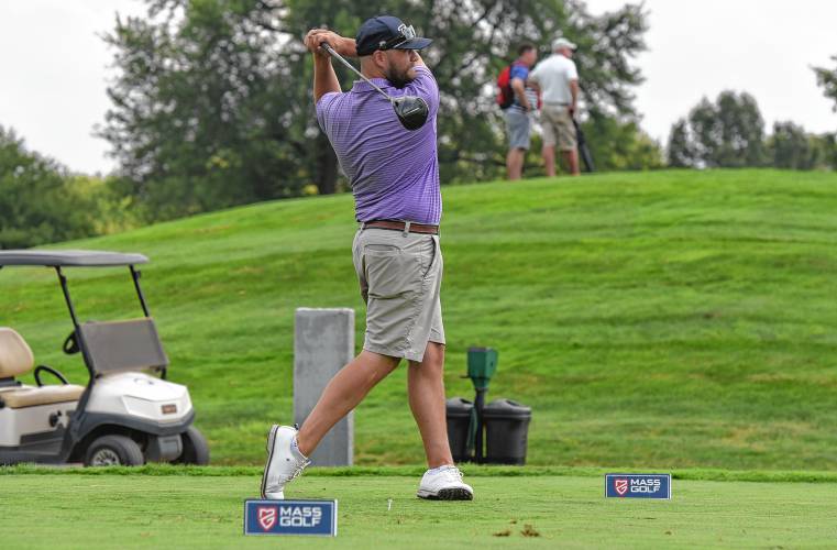 South Hadley’s Cody Miller watches his drive on 10th  tee en route to a 5-under 67 at the 43rd Massachusetts Amateur Public Links Championship at Ledges Golf Club in South Hadley on Tuesday.
