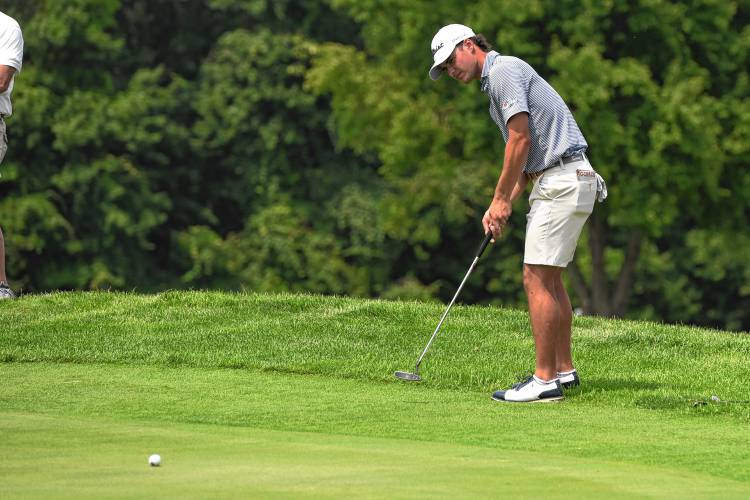 Dedham’s Joey Lenane putts from just off the 18th green during an opening-round 8-under 64 at the 43rd Massachusetts Amateur Public Links Championship at Ledges Golf Club in South Hadley on Tuesday.