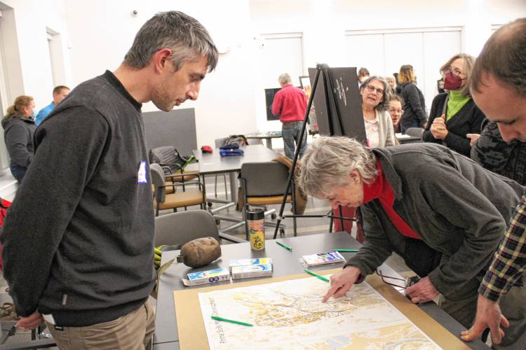 Resident Ruth Ellen Henry speaks to Conway School student Aaron Dell about Greenfield’s food scene, as The Conway School prepares to work with the city to present draft recommendations for Greenfield’s master plan.