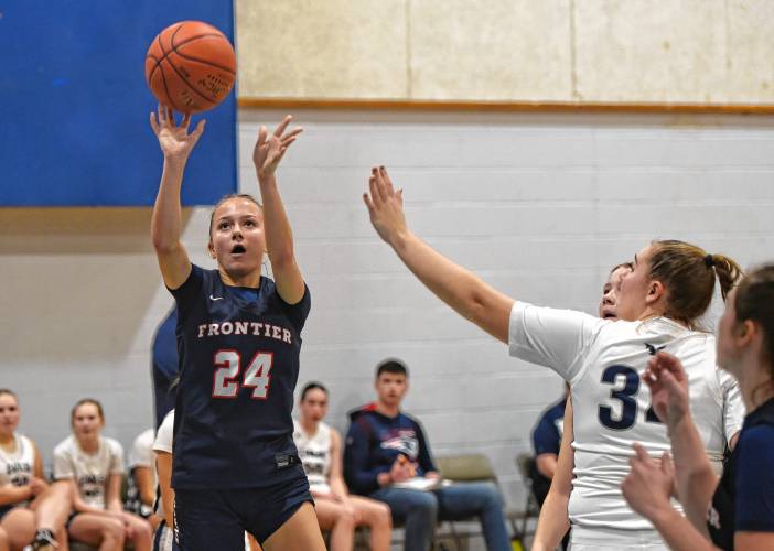 Frontier’s Jazzy Hayes (24) pulls up for a shot against Franklin Tech during the visiting Redhawks’ 82-28 victory on Friday night in Turners Falls.