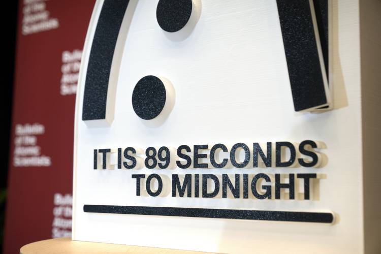 The “Doomsday Clock” of the Bulletin of the Atomic Scientists, set at 89 seconds to midnight, is displayed during a news conference at the United States Institute of Peace, Tuesday, in Washington.