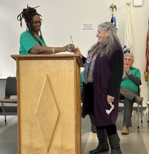 Human Rights Commission Chair Mpress Bennu, at left, presents the 2024 Human Rights Award to Wendy Goodman for her work to assist Haitian immigrants. Human Rights Commission Chair Mpress Bennu, at left, presents the 2024 Human Rights Award to Wendy Goodman for her work to assist Haitian immigrants.