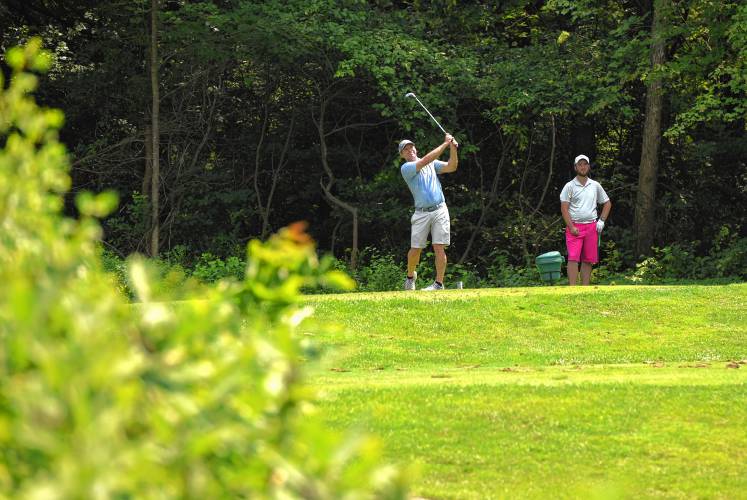Golfers tee off on the short par 3 third hole during the 43rd Massachusetts Amateur Public Links Championship at Ledges Golf Club in South Hadley on Tuesday.