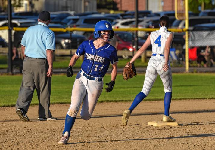 Turners Falls’ Mia Marigliano (14) rounds second and heads toward third base during state semifinal action against Hopedale on Wednesday in Worcester.