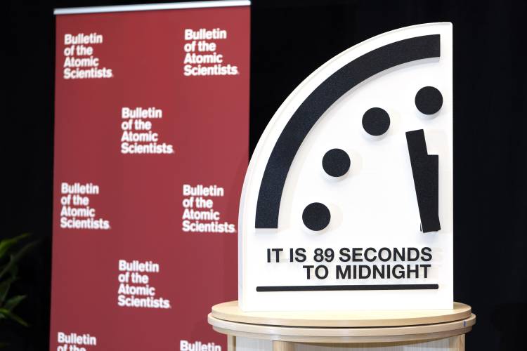 The “Doomsday Clock” of the Bulletin of the Atomic Scientists, set at 89 seconds to midnight, is displayed before a news conference at the United States Institute of Peace, Tuesday, in Washington. 