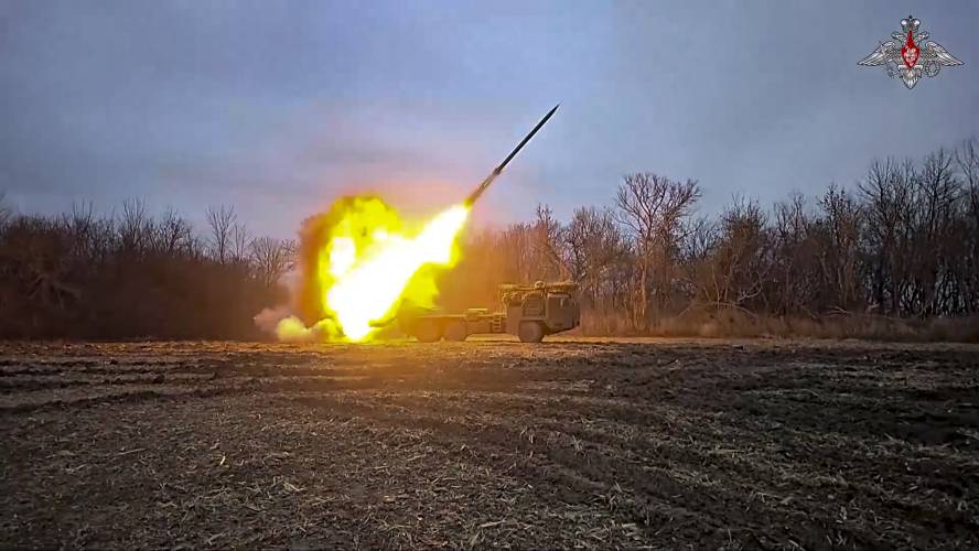 In this photo taken from a video on Thursday,  a Russian self-propelled multiple rocket launcher Uragan (Hurricane) is fired toward a Ukrainian position at an undisclosed location in the Kursk region border area.
