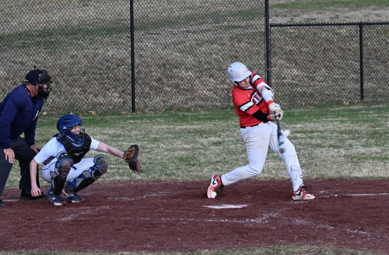 Athol’s Oliver Johnson puts the bat on the ball against Turners Falls in Montague on Tuesday.
