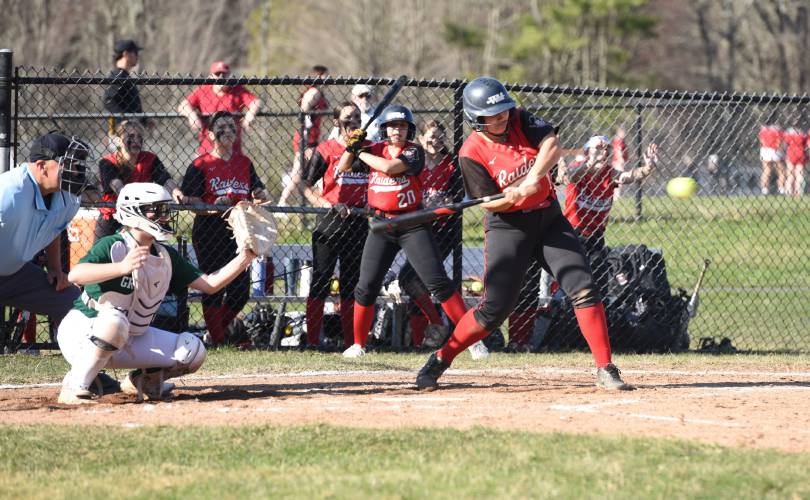 Hampshire Regional’s Teagan Charles (14) swings at a pitch from Greenfield pitcher MacKenzie Paulin during the Radiers’ 4-0 win over the Green Wave on Monday afternoon in Westhampton.