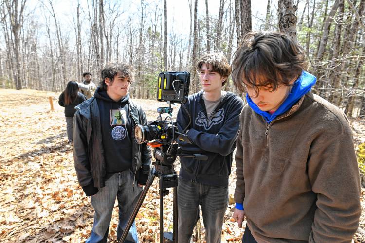 Emerson College students Jacques Ciambra, Thomas McVay and Silas Lambros work on a short film at Salamander Hollow Healing Habitat in Warwick.