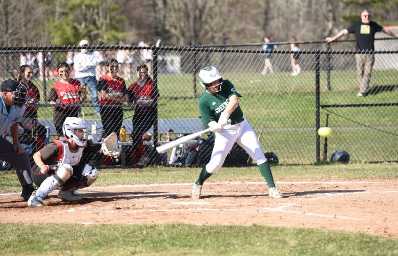 Greenfield’s Madison Lemay (25) swings at a pitch from Hampshire Regional’s Ryanne Dubay during the Radiers’ 4-0 win over the Green Wave on Monday afternoon in Westhampton.