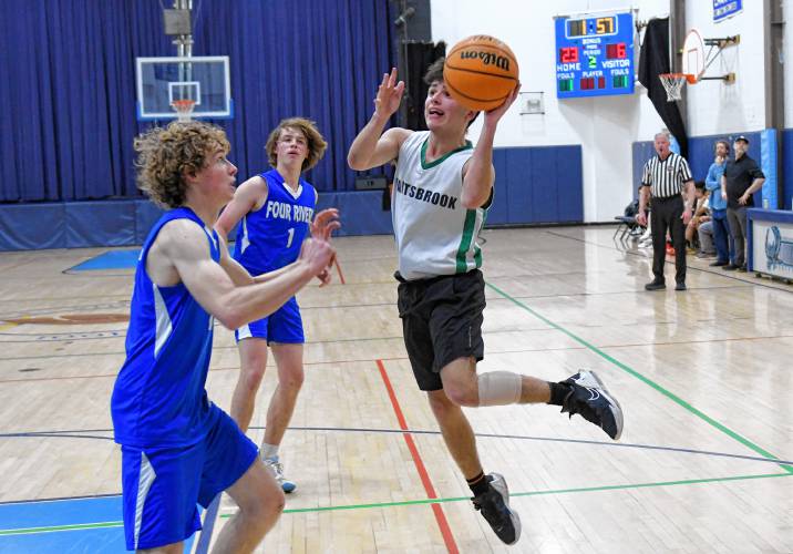 Hartsbrook School’s Rowen Novik goes up for a shot against Four Rivers during the River Valley Athletic League championship game in Greenfield on Thursday.