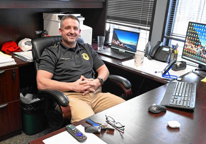 Greenfield Police Chief Todd Dodge, pictured in his office, says he believes a recent uptick in firearms license applications occurred as a consequence of the new state law setting stricter training requirements for first-time license applicants.