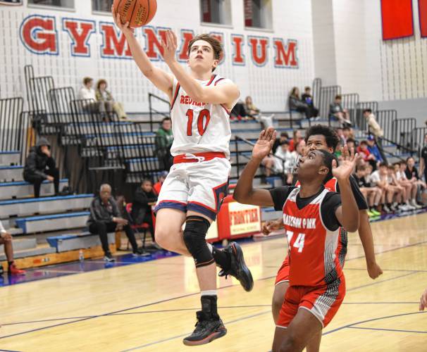Frontier’s Max Millette goes up for two against Madison Park Tech during the Redhawks’ 81-46 victory in the MIAA Division 4 preliminary round on Tuesday night at Goodnow Gymnasium in South Deerfield.