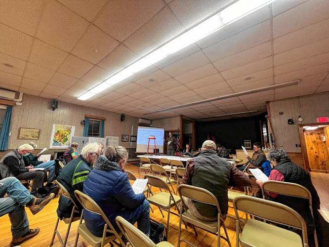 Residents gathered at Gill Town Hall on Tuesday night for a public hearing hosted by the Gill Conservation Commission regarding the state Department of Environmental Protection’s draft decision approving a water quality certification for FirstLight Hydro Generating Co.