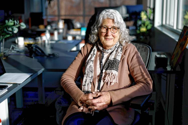 President and CEO of ServiceNet Susan Stubbs sits at her desk for a portrait Friday afternoon at the nonprofit’s headquarters at Village Hill in Northampton.