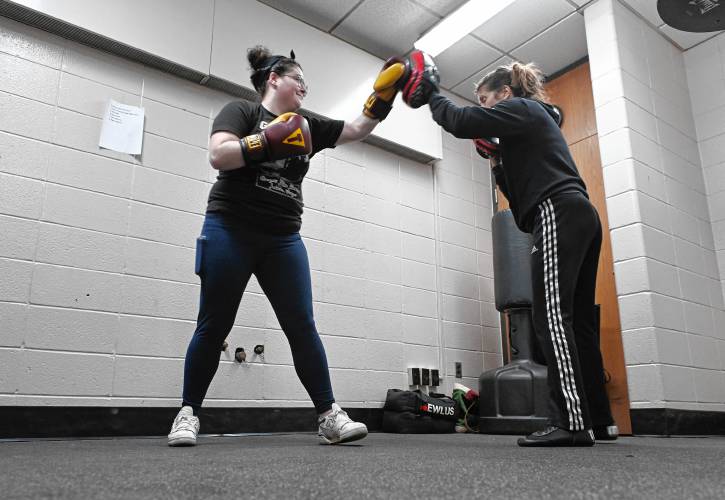 Greenfield Recorder reporter Madison Schofield learns the basics of boxing from Vanessa Chakour, a former professional boxer who has begun teaching women’s boxing classes at Franklin County’s YMCA.