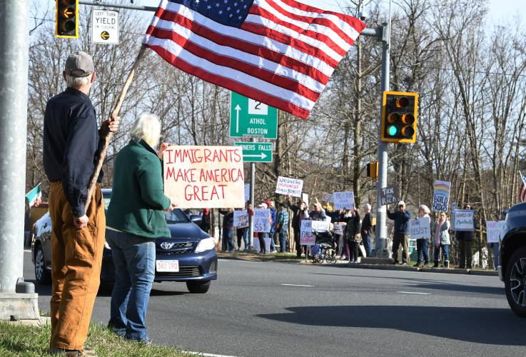 Demonstrators protest the Trump administration during weekly standouts at the intersection of Route 2 and Main Road in Gill.