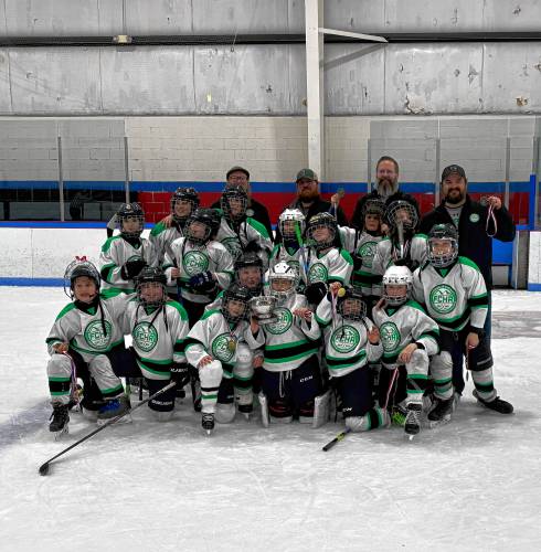 The FCHA 10U hockey team after winning its league championship on Sunday at Olympia Ice Center. 