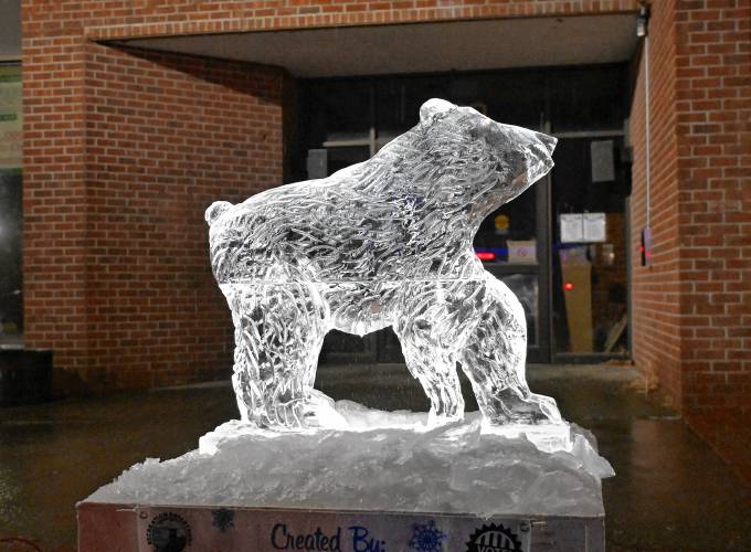 Chip Kopser of Mashpee carved this bear out of a block of ice at the Winter Carnival in Greenfield last week.