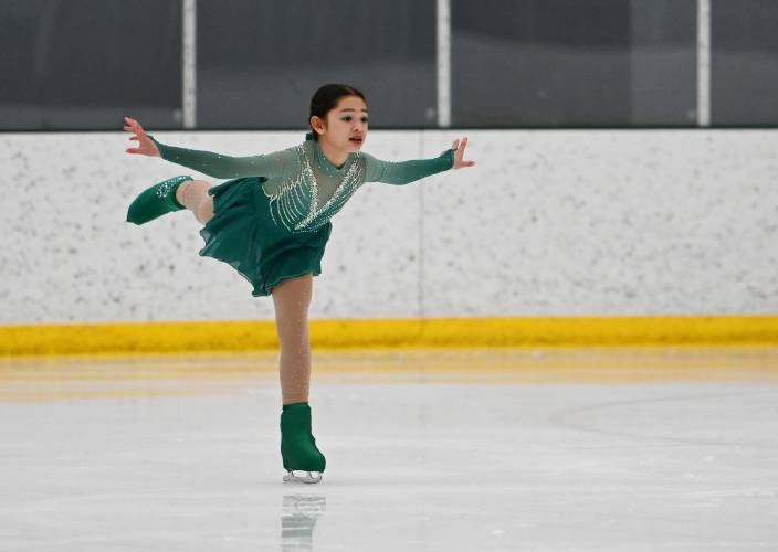 Sunderland Elementary School fourth grader Anjolina Elias skates to “Riverdance” at the ice rink at Deerfield Academy during the New England West Skating Show on Saturday.
