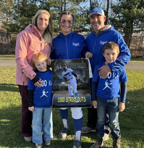 Turners Falls’ Madi Liimatainen poses with her family after recording the 1,000th strikeout of her varsity career against Frontier on Wednesday at Zabek Field in South Deerfield.