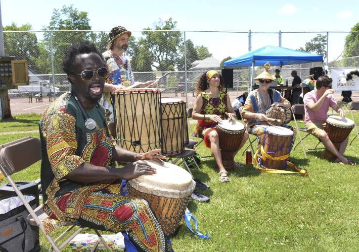 Alpha Kabisko Kaba leads a drum circle at the 2023 Juneteenth celebration at Beacon Field in Greenfield. This year’s event will be held Wednesday.