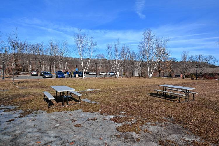 Officials tour a possible new site for a library at 38 Avenue A in Turners Falls.