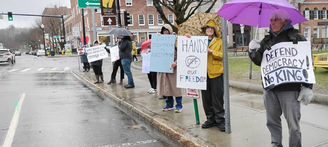 Protesters gather along the Greenfield Common on Saturday as part of “Hands Off!,” a national mobilization day in which residents held demonstrations to rally against actions taken by President Donald Trump and billionaire Elon Musk, and executive orders and policies put in place, since January.