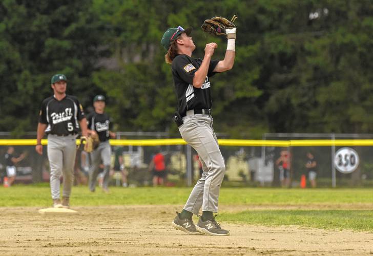 Greenfield Post 81 shortstop Jackson Campbell hauls in a fly ball during his the team’s American Legion Senior Division quarterfinal game against Wilbraham on Monday night at Vets Field in Greenfield.