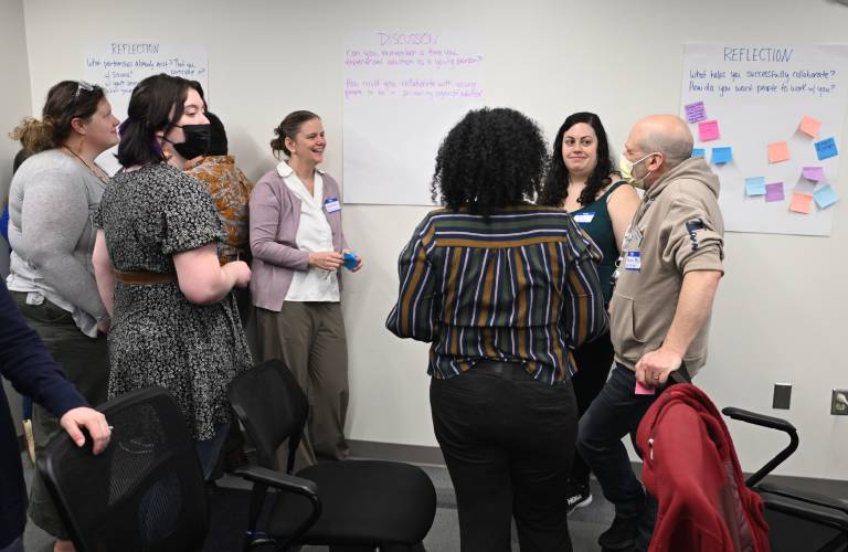 Attendees participate in group discussions during a Youth Partnership Summit hosted by the Community Health Center of Franklin County at its Greenfield offices at 102 Main St. on Friday.
