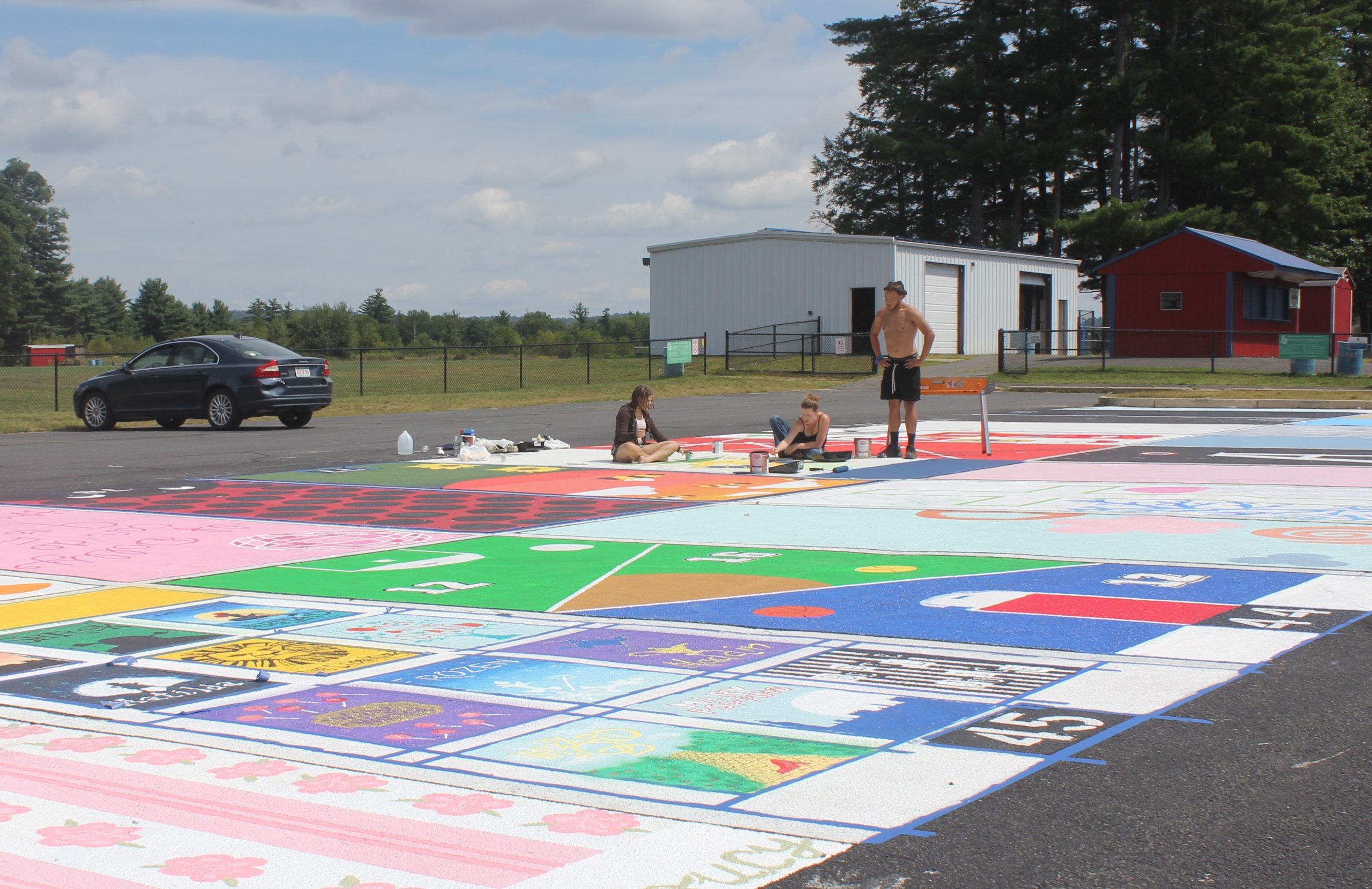Putting their passions on the pavement: Mahar seniors paint custom parking spots